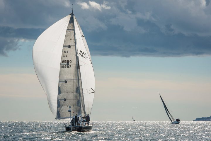 "Dragonfly" heads downwind in the lead during The Prince of Wales Trophy race sponsored by The Royal Nova Scotia Yacht Squadron,  the oldest yacht club in the Americas.