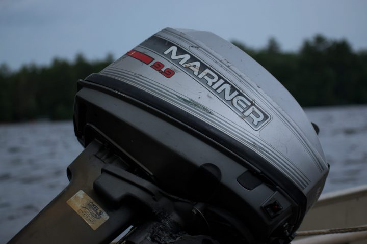 black and gray Mariner outboard motor